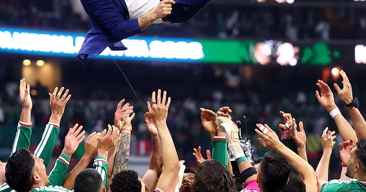 Soccer Football - FIFA World Cup 2026 - Round of 32 - Mexico v Ecuador - Estadio Azteca, Mexico City, Mexico - June 30, 2026 Former Mexico player Andres Guardado is thrown in the air in celebration by the players after the match as Mexico qualify for the round of 16 stage of the World Cup REUTERS/Eloisa Sanchez